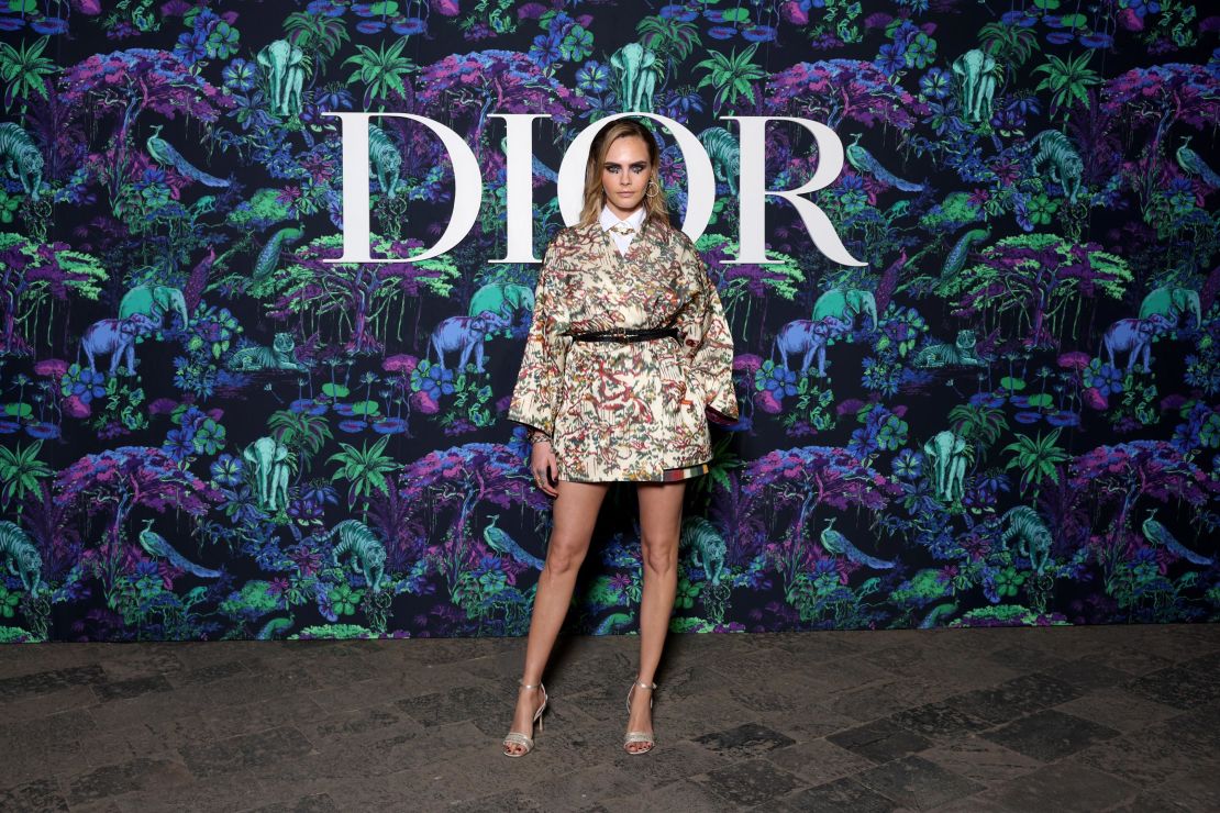 Cara Delevingne attends the Christian Dior Womenswear Pre-Fall 2023 show at the Gateway of India monument.