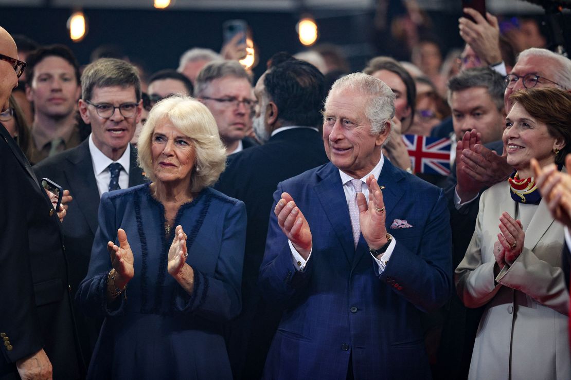 Britain's King Charles III and Britain's Camilla, Queen Consort, applaud an act as thevisit the Reception Schuppen 52 event venue in Hamburg, northern Germany on March 31, 2023. - Britain's Royal Couple is on a three-day tour in Germany for Charles' first state visit as king, with the trip billed as "an important European gesture" to maintain strong ties after Brexit. (Photo by ADRIAN DENNIS / AFP) (Photo by ADRIAN DENNIS/AFP via Getty Images)