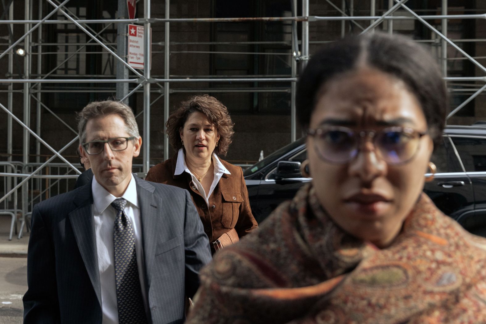 Prosecutors Matt Colangelo, left, and Susan Hoffinger, center, walk outside the Manhattan Criminal Courthouse on March 22, 2023.