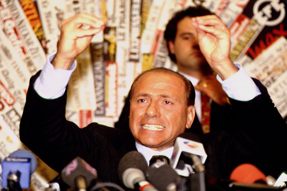 Berlusconi announcing his debut in politics to press in 1993.