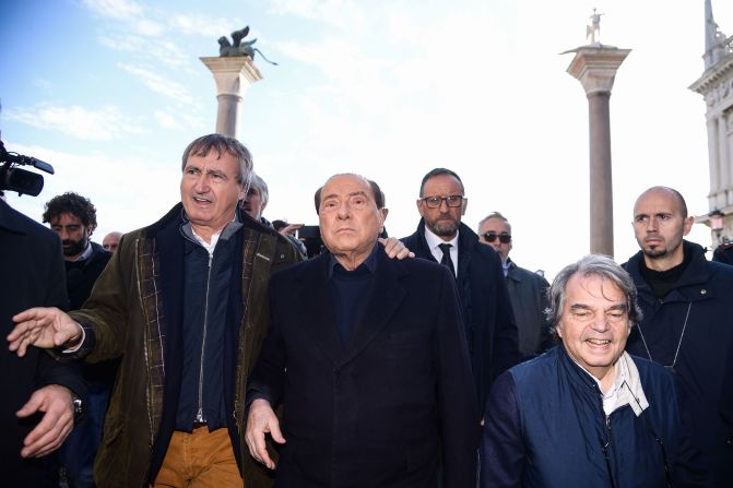 From left, Venice Mayor Luigi Brugnaro, Berlusconi and Forza Italia MP Renato Brunetta assess flood damage in Venice, Italy, in 2019.