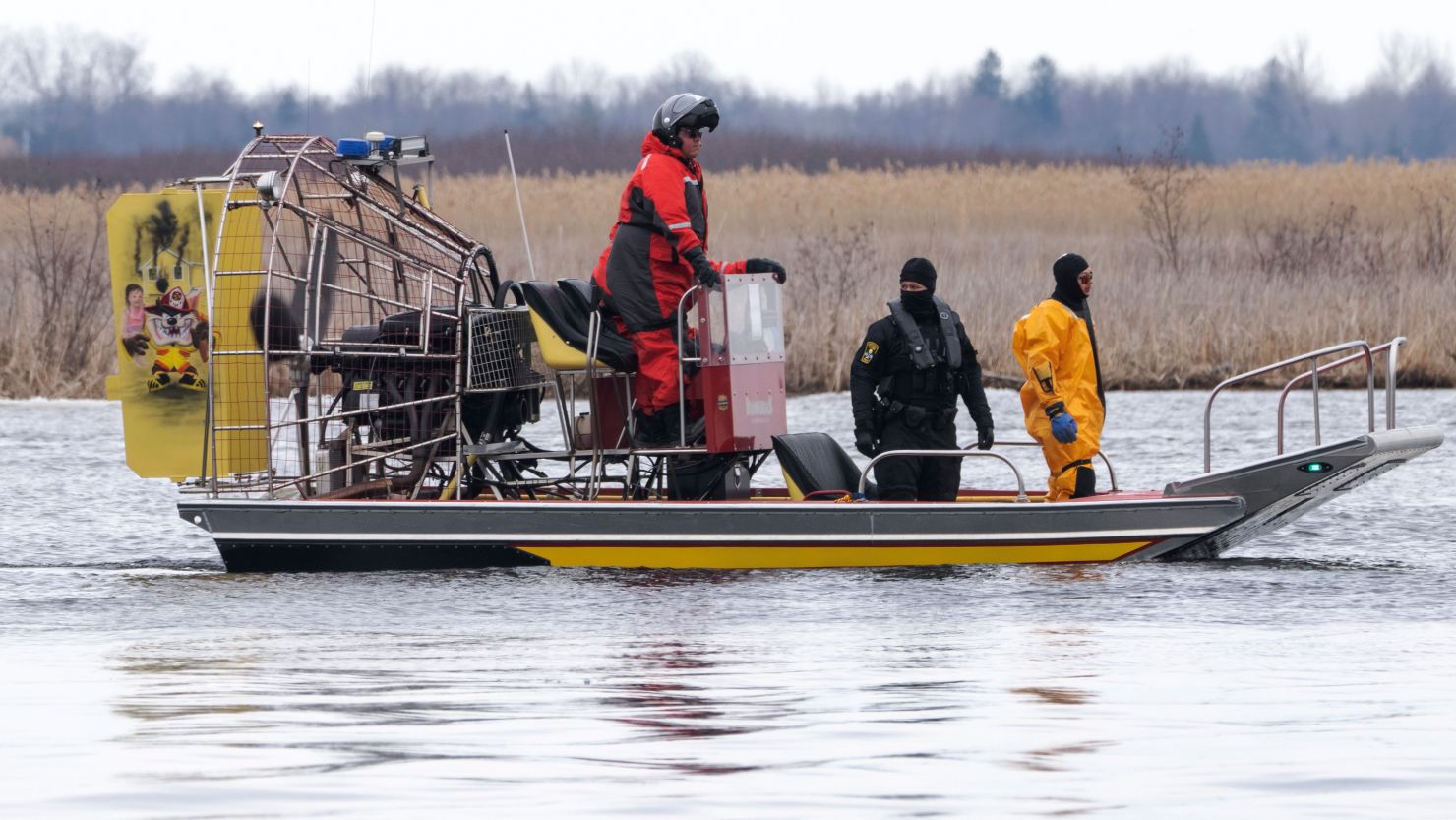 Searchers look for victims in Akwesasne, the Mohawk Nation territory in Canada on Friday