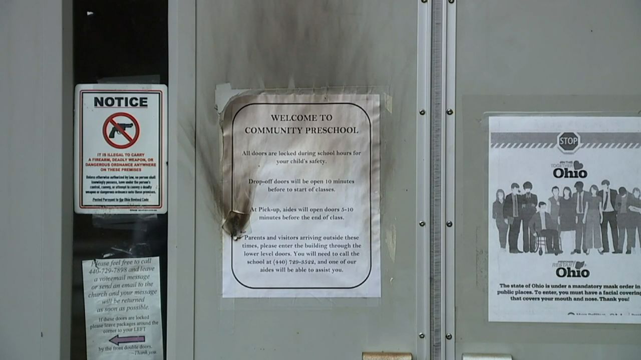 Burn marks are seen on the door of the Community Church of Chesterland (CCC), in Chesterland, Ohio.