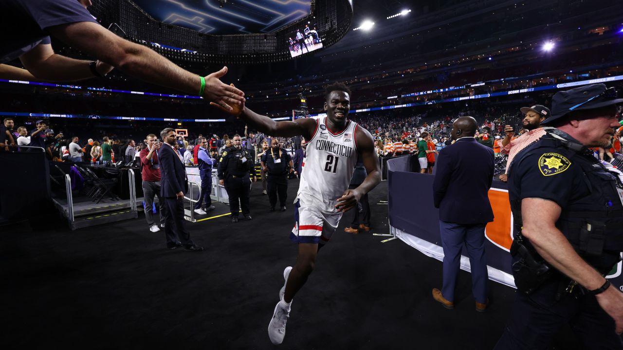 Adama Sanogo #21 of the Connecticut Huskies celebrates after defeating the Miami Hurricanes during the NCAA Men's Basketball Tournament Final Four semifinal game Saturday at NRG Stadium in Houston, Texas. 