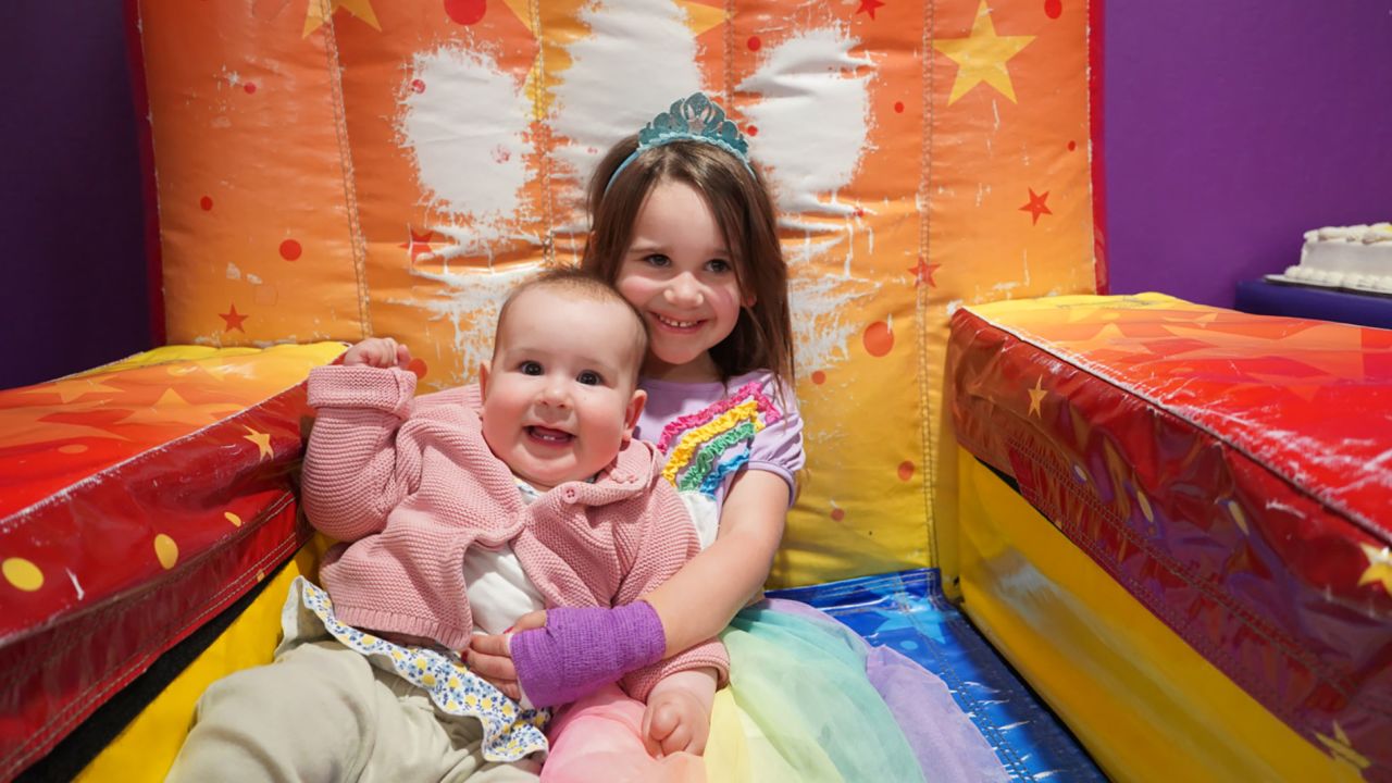 Lena recovering with her sister Anna.