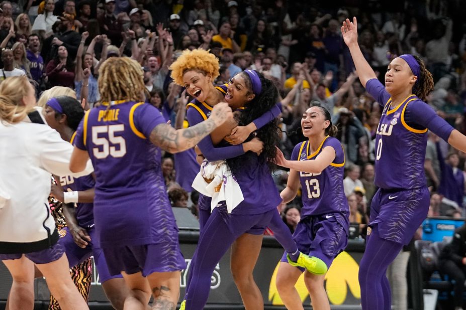LSU players celebrate after Jasmine Carson hit a buzzer-beating 3-pointer to end the first half. The Tigers led Iowa 59-42.