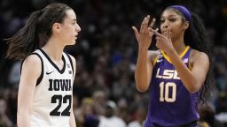 LSU's Angel Reese reacts in front of Iowa's Caitlin Clark during the second half of the NCAA Women's Final Four championship basketball game Sunday, April 2, 2023, in Dallas. LSU won 102-85 to win the championship. (AP Photo/Tony Gutierrez)