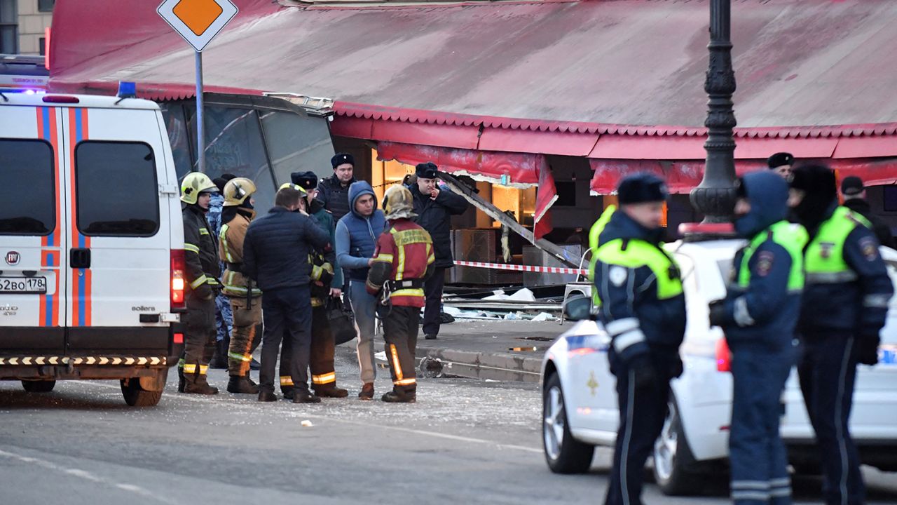 St. Petersburg cafe explosion: Videos show moments leading up to blast killing Tatarsky 4 Russian police investigators inspect a damaged 'Street bar' cafe in a blast in St. Petersburg on April 2.