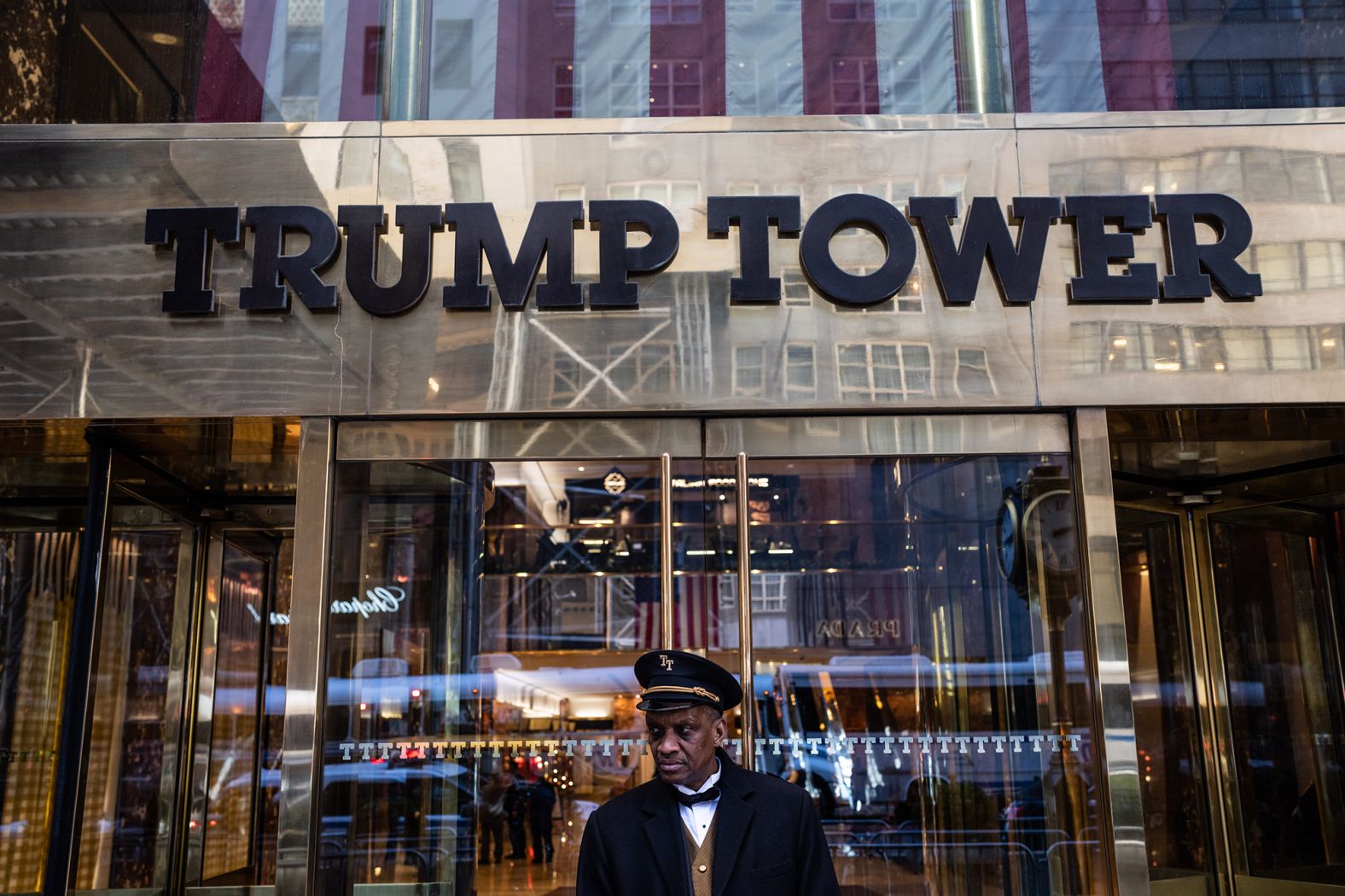 A doorman stands outside of Trump Tower on April 3.