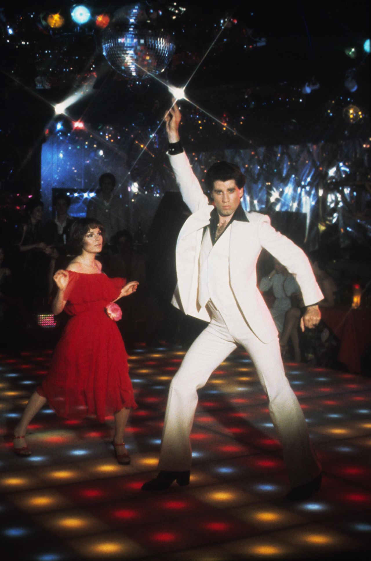 Travolta wore the white suit in the film's famous dance competition scene.