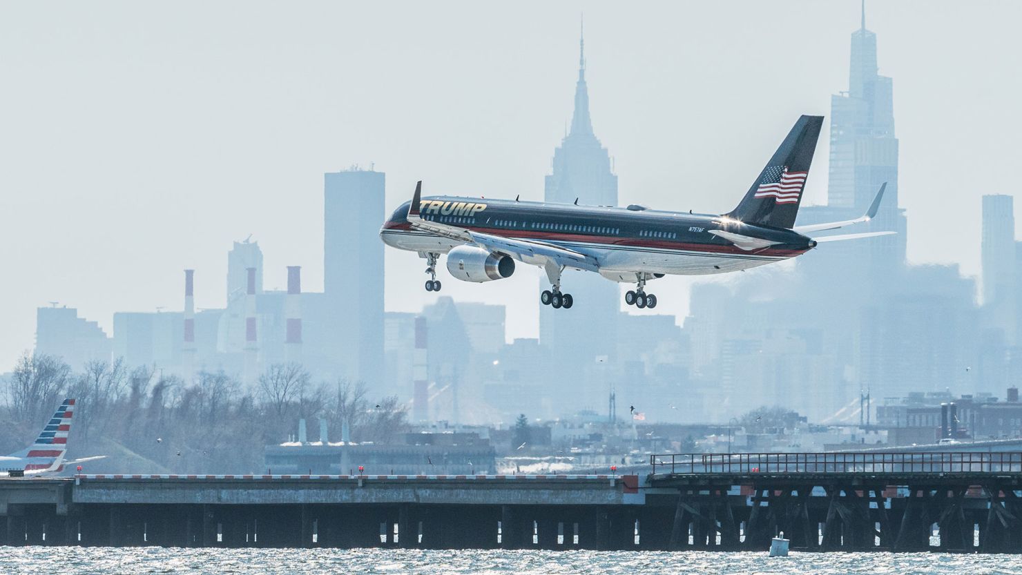 The plane carrying former president Donald Trump lands at LaGuardia airport in New York, April 3, 2023. He will face a judge tomorrow, on charges in a still sealed indictment.