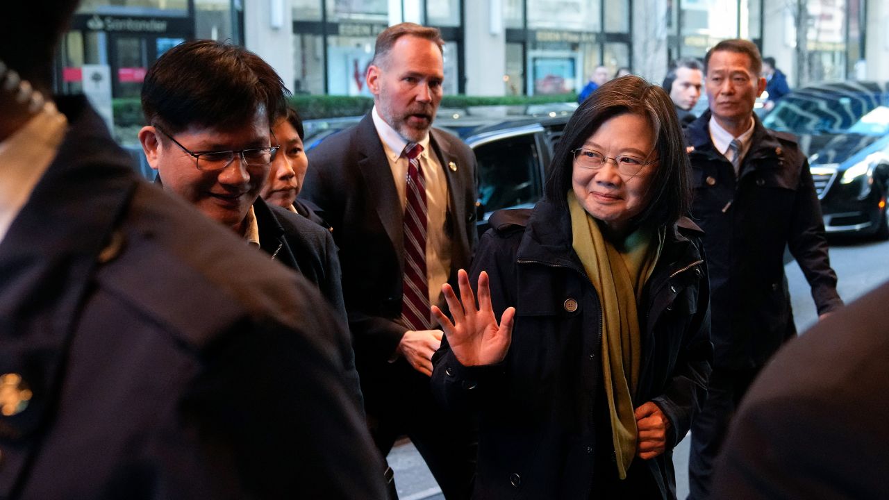 Taiwan's President Tsai Ing-wen waves as she arrives at a hotel in New York, Thursday, March 30, 2023, a day before flying to Central America.