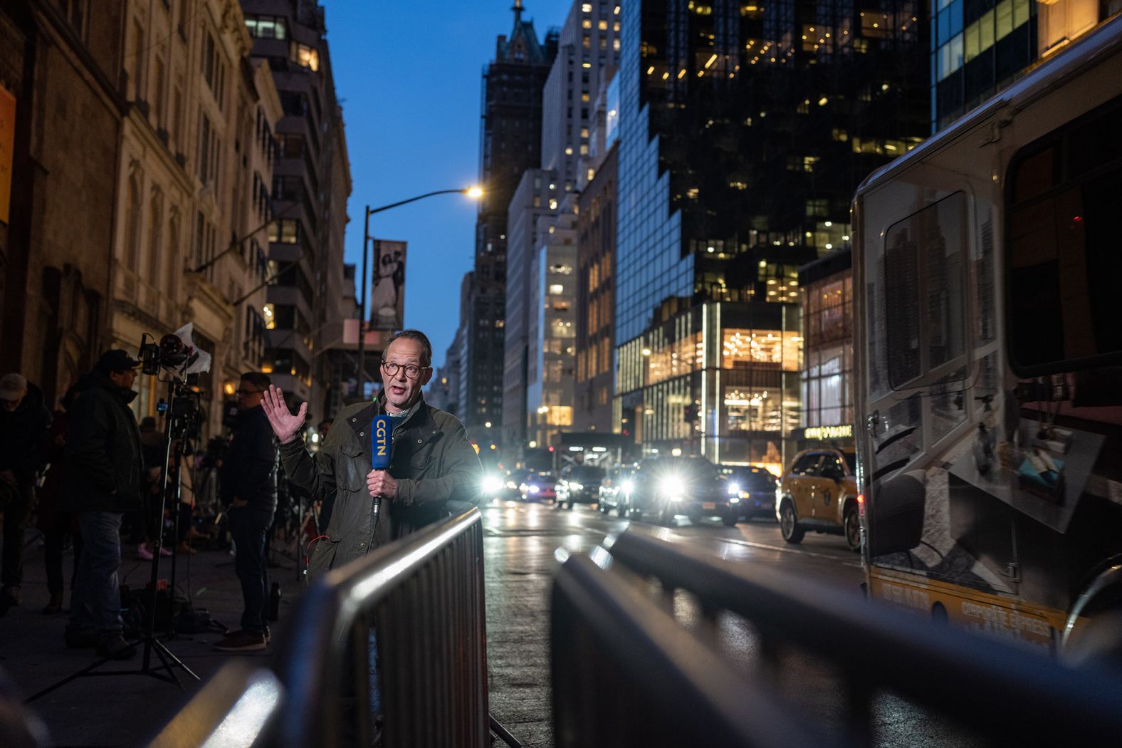 News crews broadcast near Trump Tower on April 3, 2023.