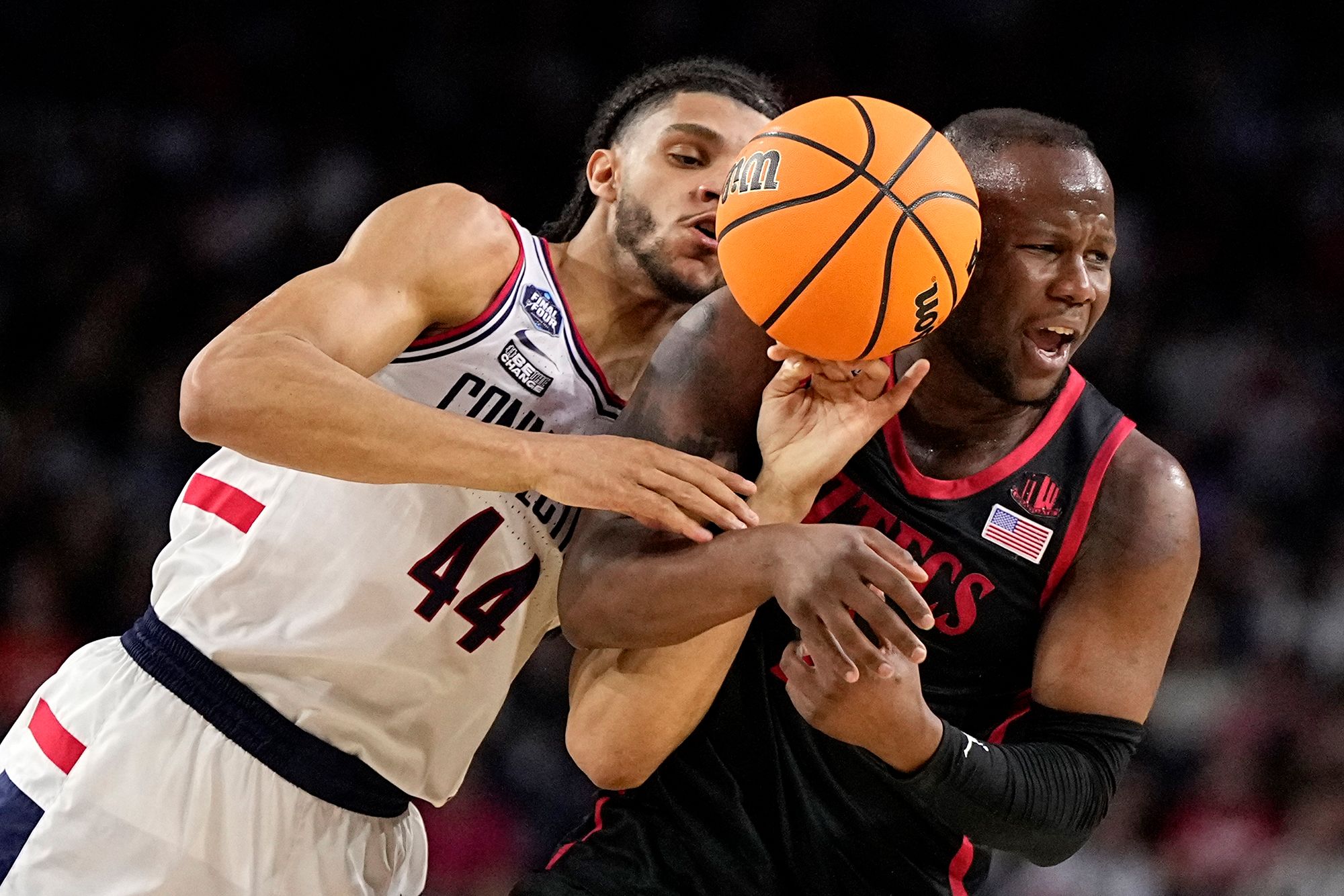 Jackson competes for the ball with San Diego State's Adam Seiko.