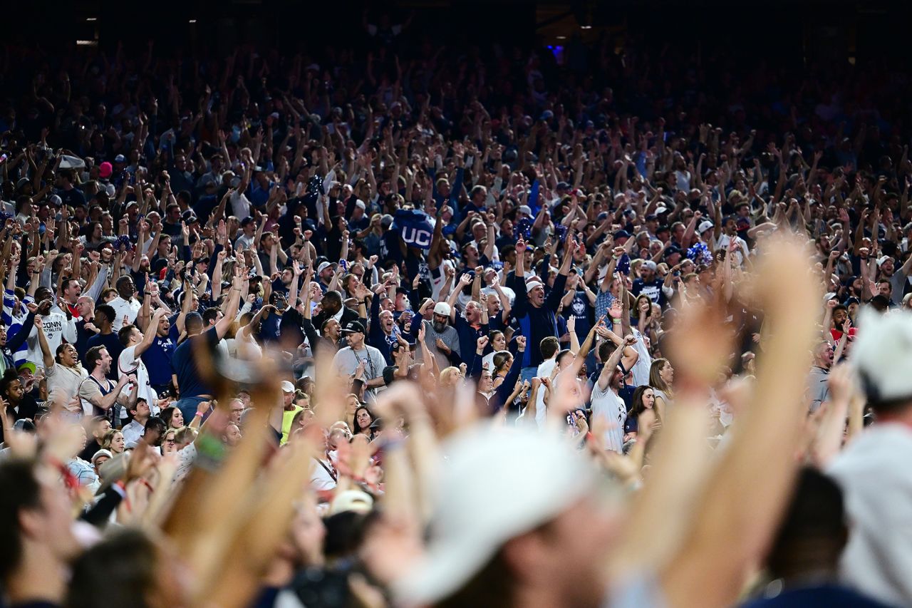 UConn fans celebrate during the first half.