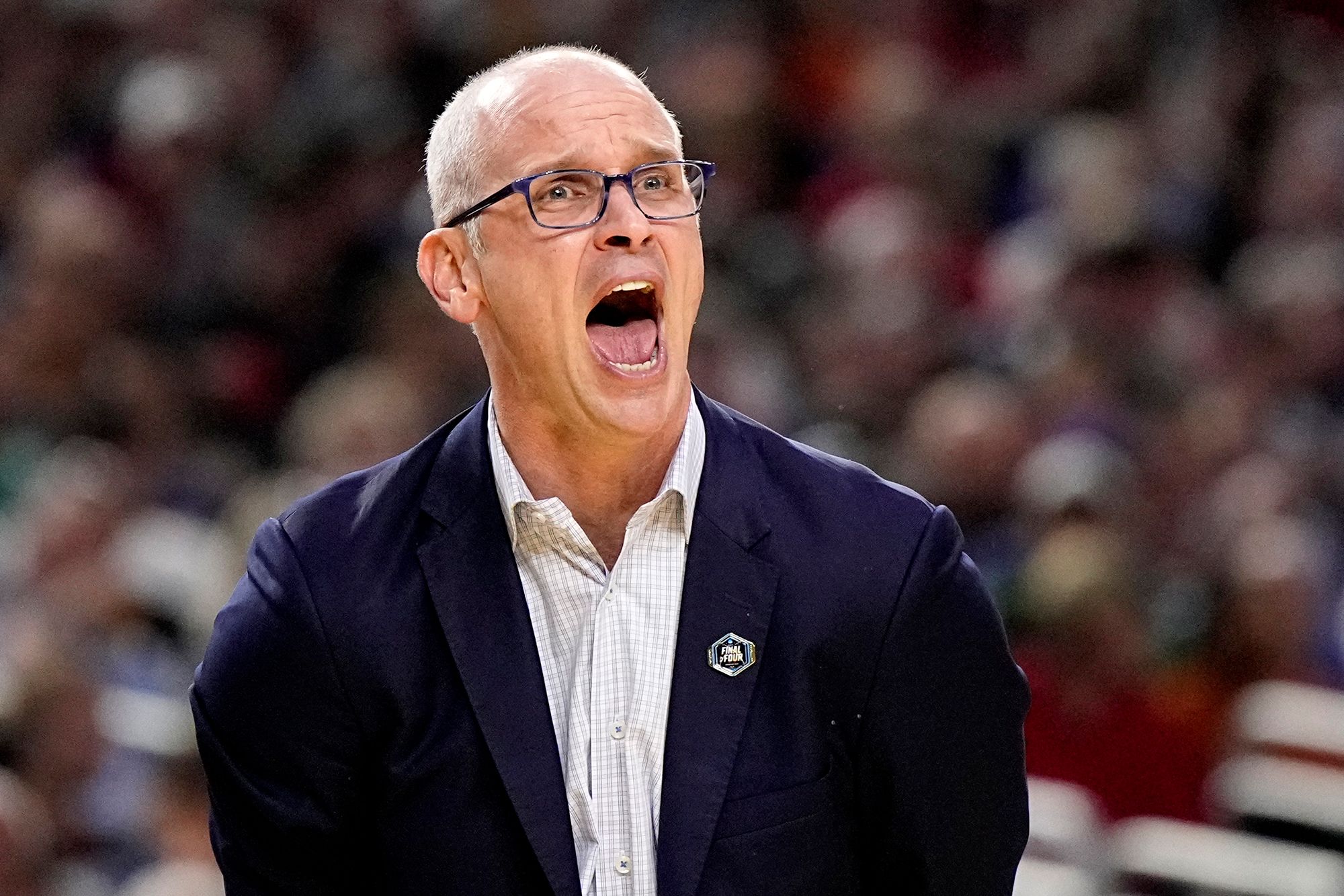 UConn head coach Dan Hurley yells during the first half.