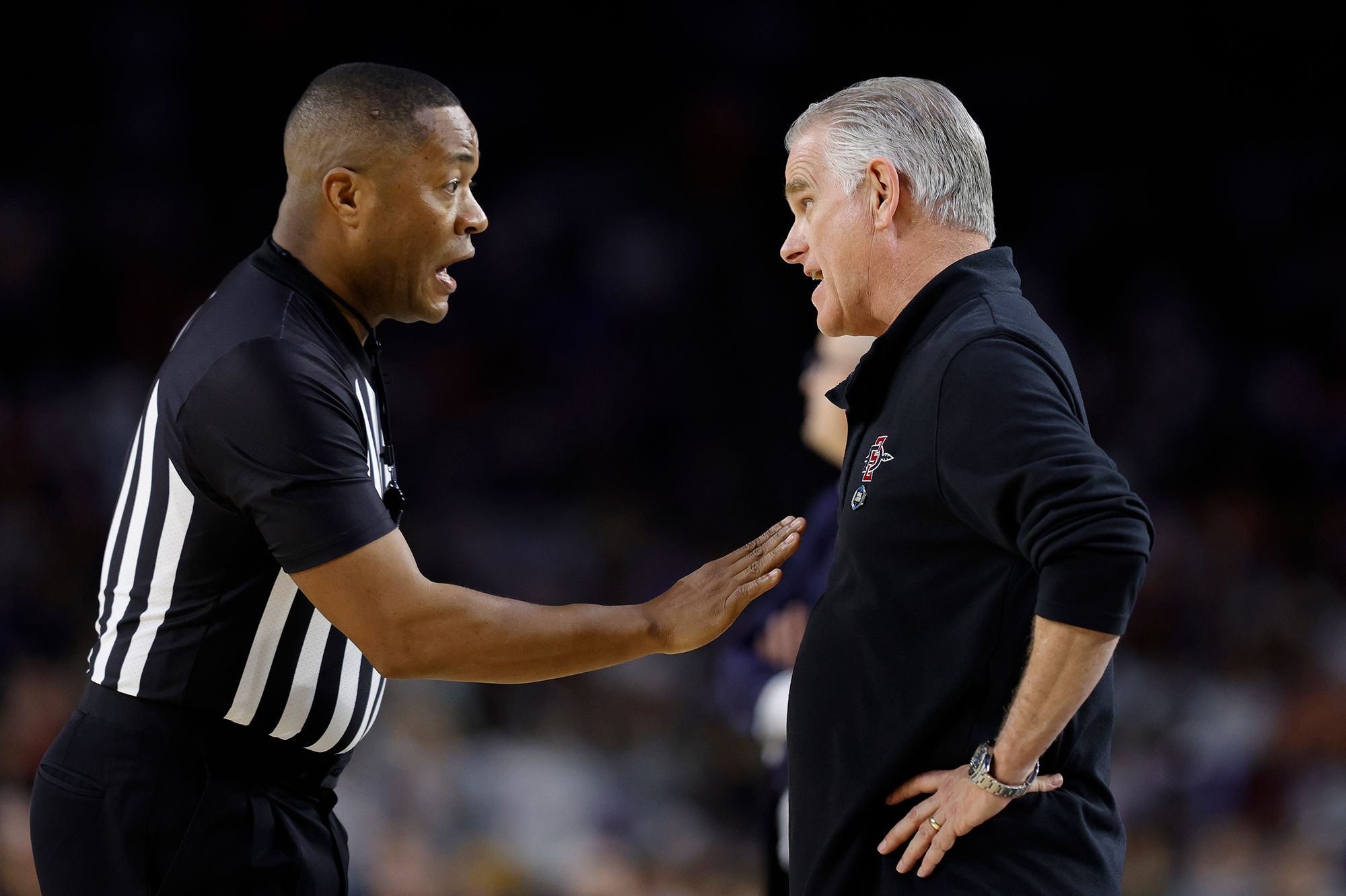 San Diego State head coach Brian Dutcher argues a call during the second half.