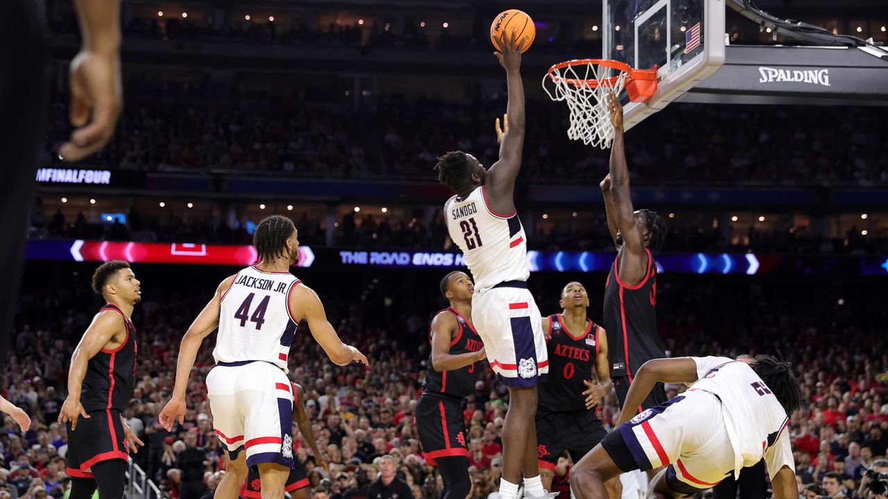 UConn's Adama Sanogo shoots against Nathan Mensah of San Diego State during the first half of the title game.