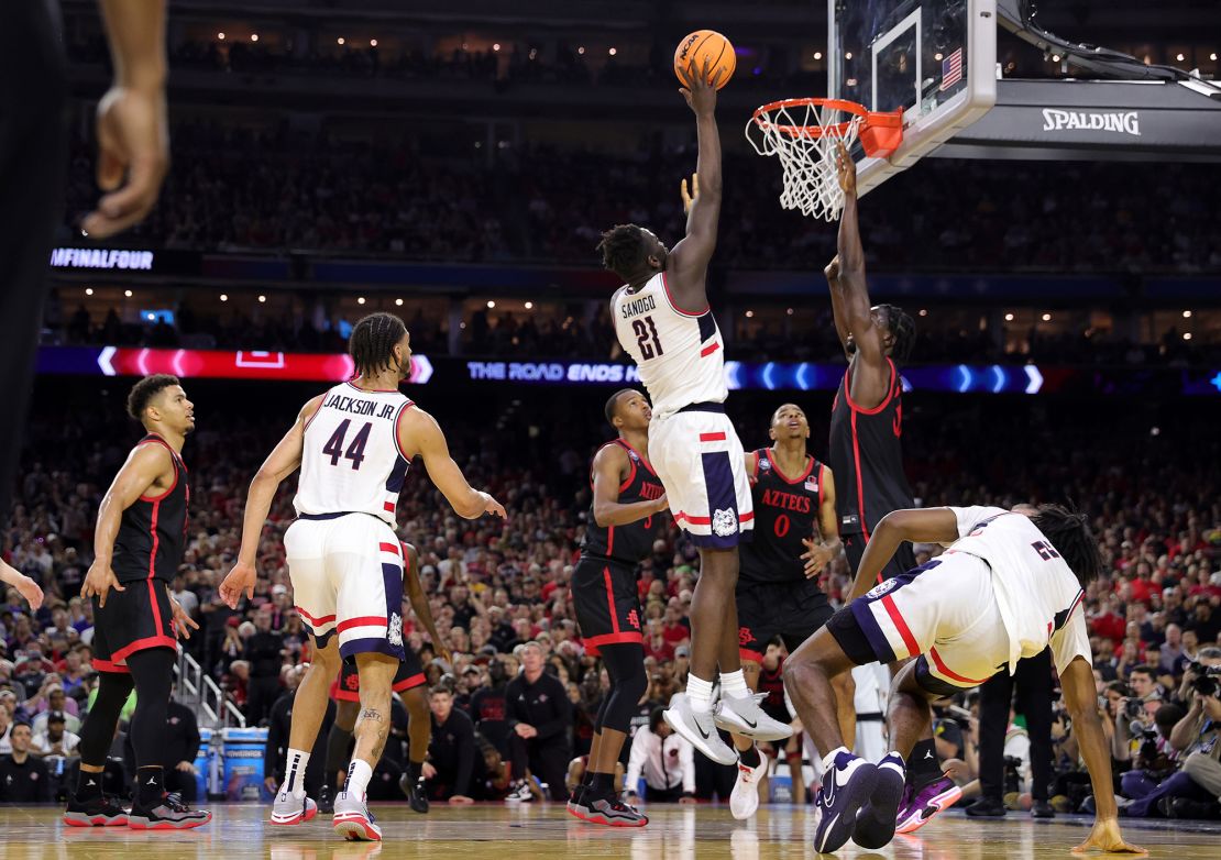 UConn's Adama Sanogo shoots against Nathan Mensah of San Diego State during the first half of the title game.