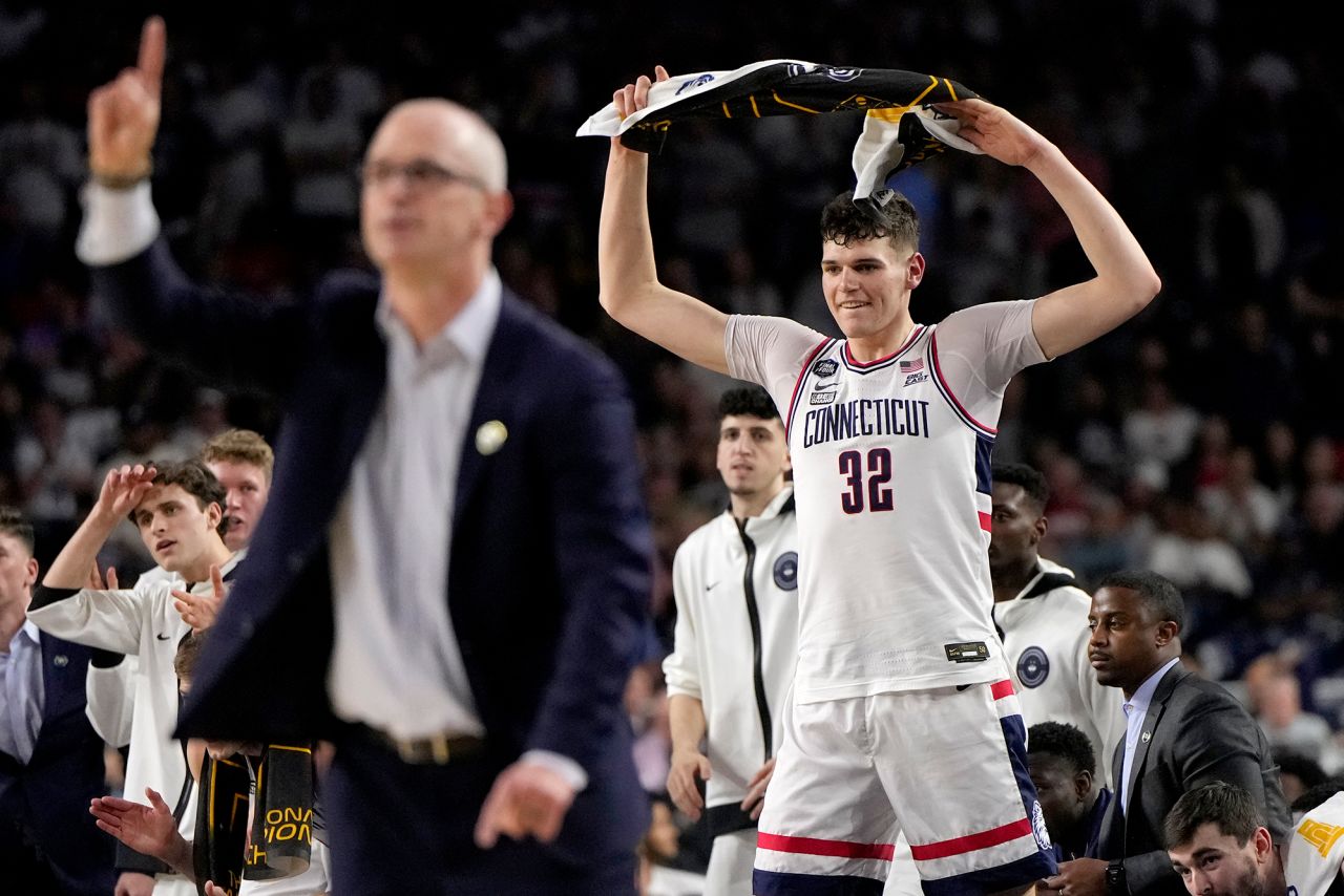 UConn's Donovan Clingan watches the game during the second half.