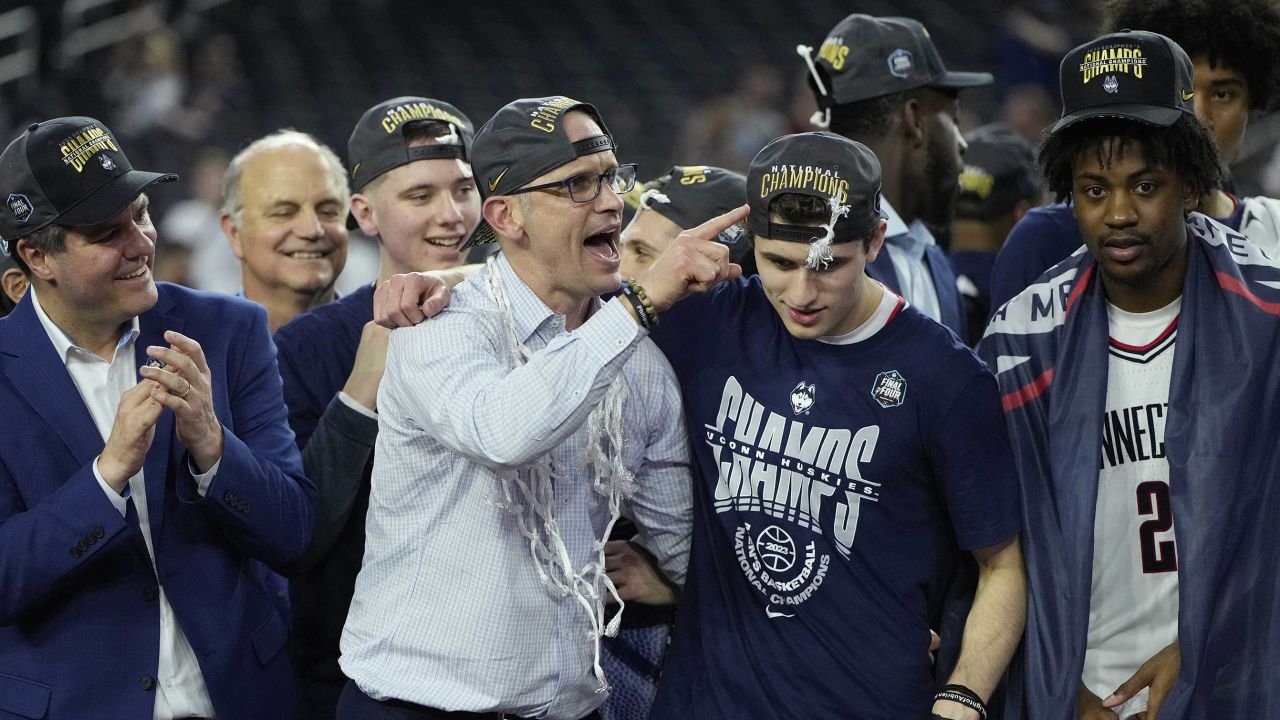 UConn head coach Don Hurley (left) celebrates with his son Andrew after defeating the San Diego State Aztecs in the NCAA Men's National Championship game.