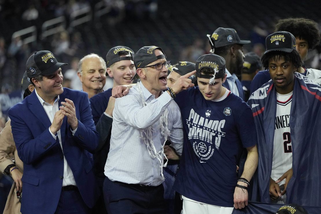 UConn head coach Dan Hurley (left) celebrates with his son Andrew after defeating the San Diego State Aztecs in the NCAA men's national championship game.