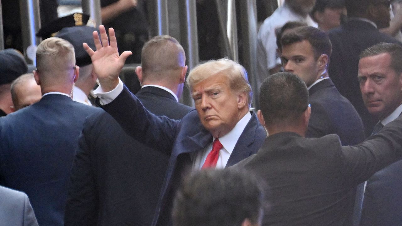 Former US president Donald Trump arrives ahead of his arraignment at the Manhattan Federal Court in New York City on April 4, 2023. 