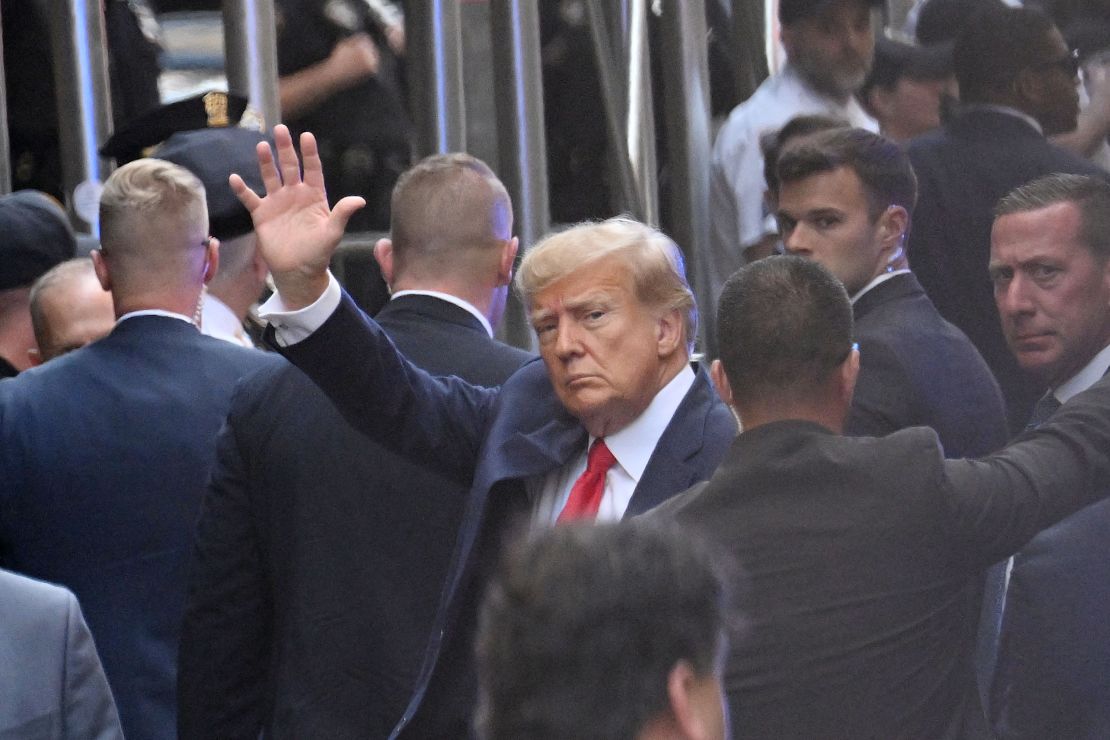 Former US president Donald Trump arrives ahead of his arraignment at the Manhattan Federal Court in New York City on April 4, 2023. 