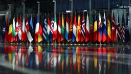 A photo shows member country flags in the arrivals area ahead of a NATO North Atlantic Council (NAC) meeting of Foreign Affairs ministers, at the NATO headquarters in Brussels, on April 4, 2023. (Photo by Kenzo TRIBOUILLARD / AFP) (Photo by KENZO TRIBOUILLARD/AFP via Getty Images)