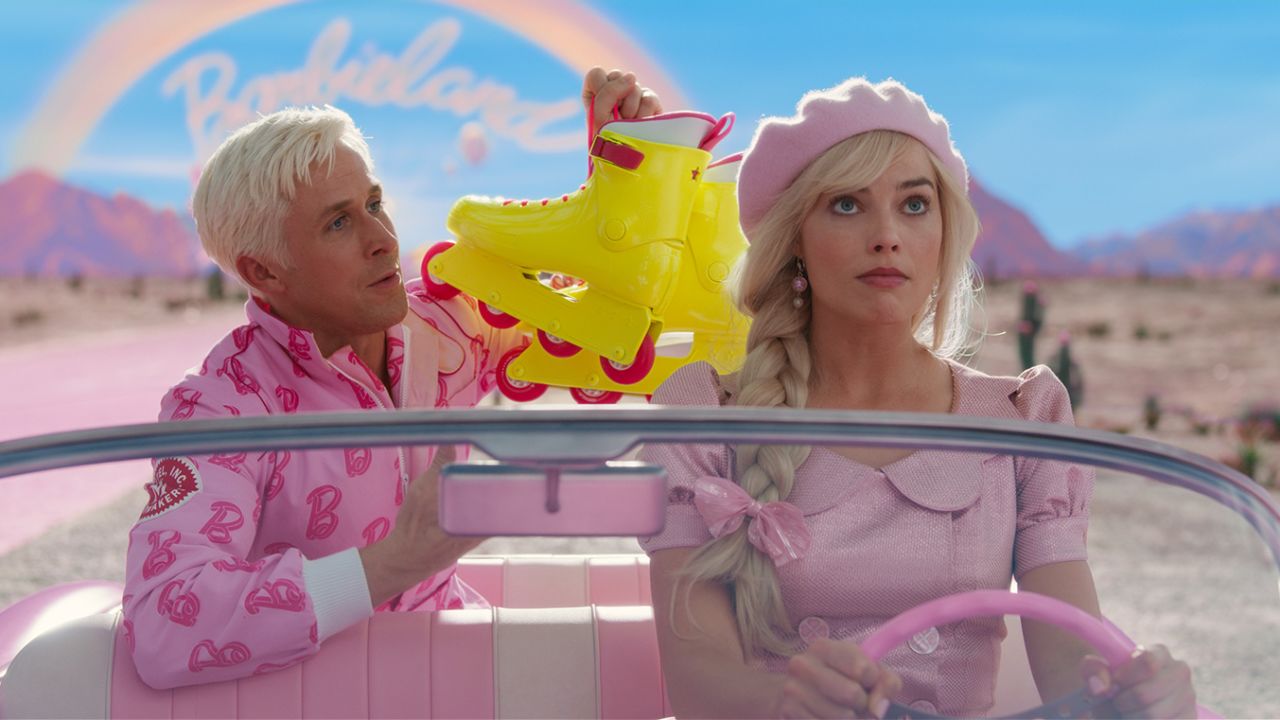 'Barbie' stars Margot Robbie and Ryan Gosling hit the road in bubblegum