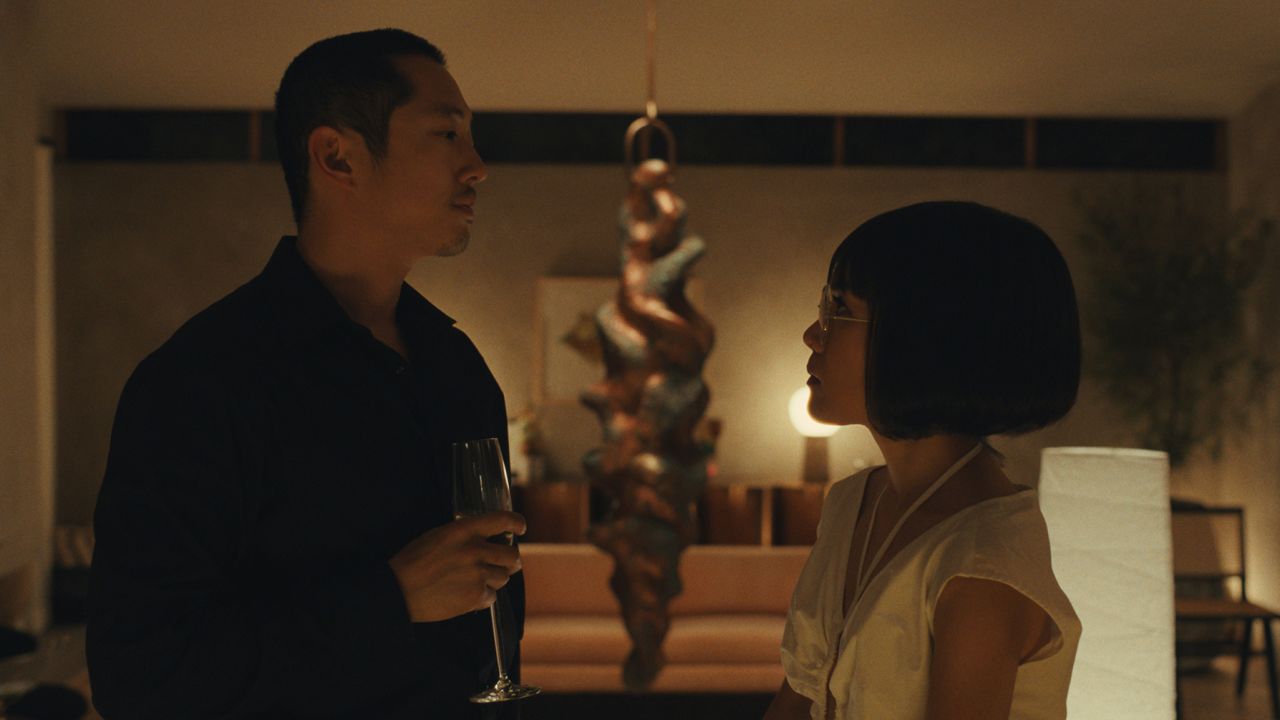 Steven Yeun as Danny and Ali Wong as Amy in "Beef."