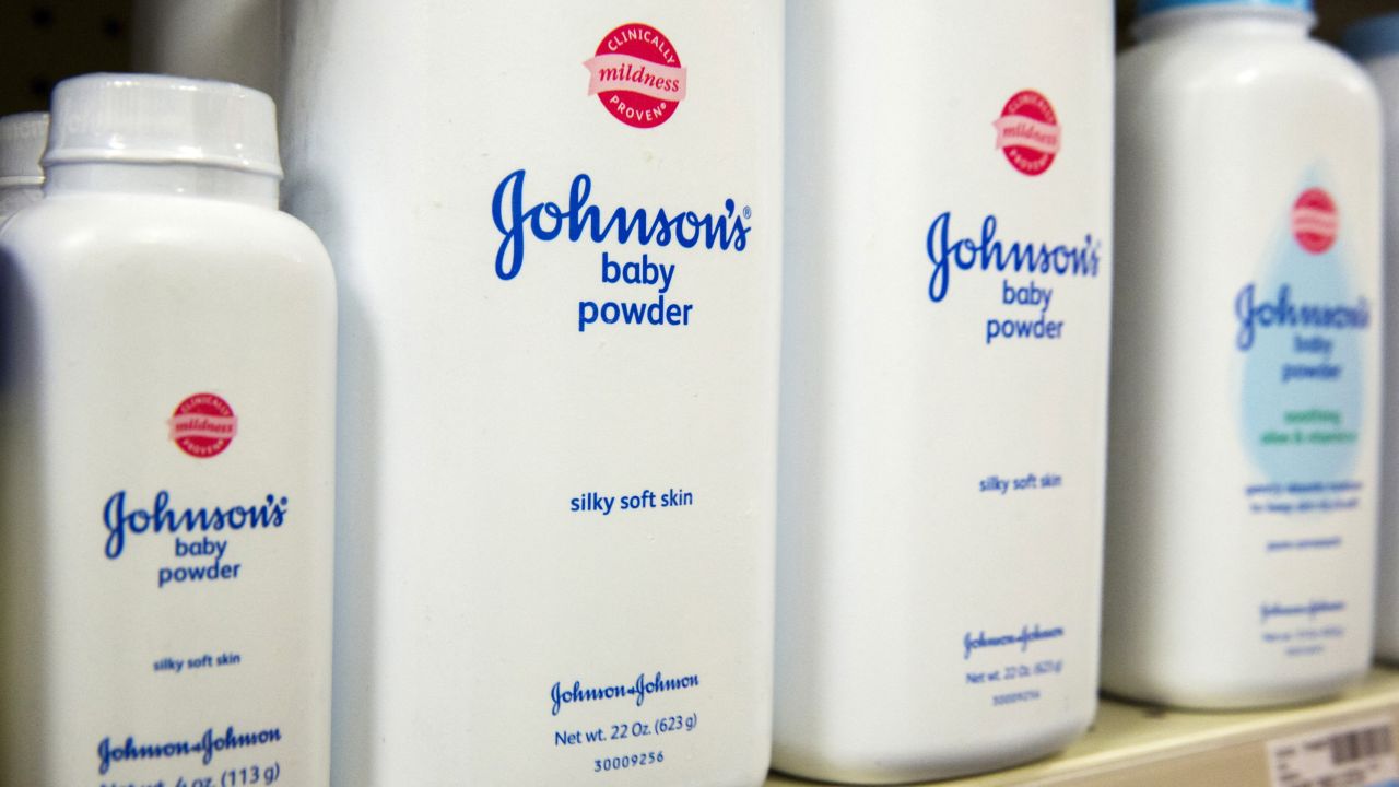 Bottles of Johnson & Johnson baby powder line a drugstore shelf in New York October 15, 2015.  REUTERS/Lucas Jackson/File Photo