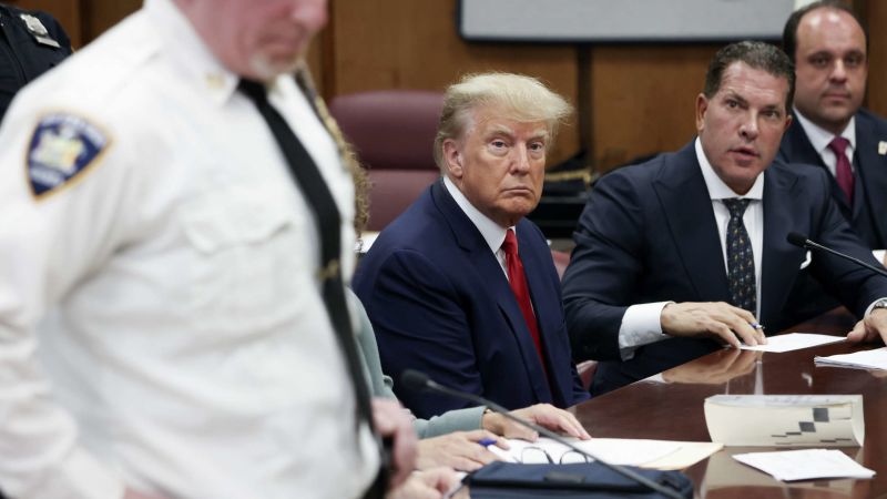 NextImg:Opinion: The day Trump became just another defendant | CNN