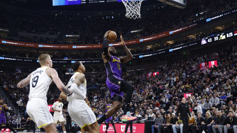 NextImg:LeBron James hailed as the 'GOAT' by his Los Angeles Lakers teammates after a crucial 135-133 road win | CNN