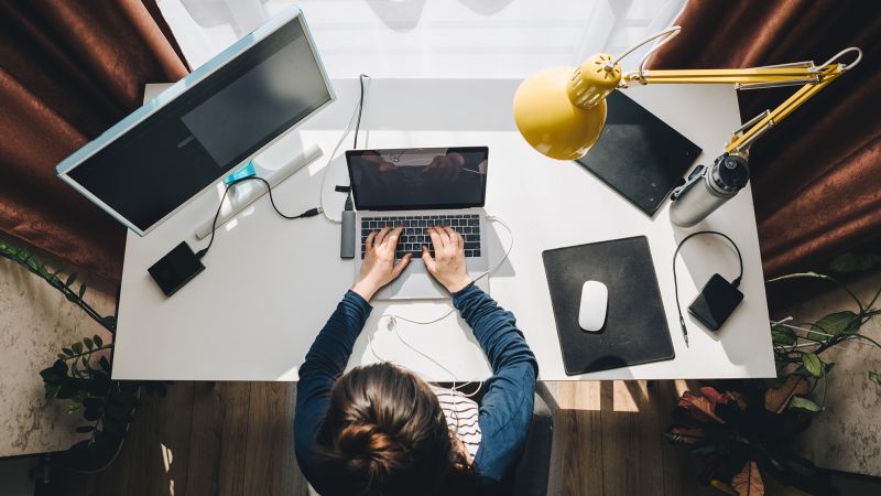 NextImg:The latest on hybrid work: Who is WFH and who isn't | CNN Business