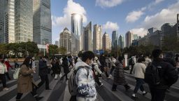 Pedestrians in Pudong's Lujiazui Financial District in Shanghai, China, on Tuesday, January 3, 2023. 