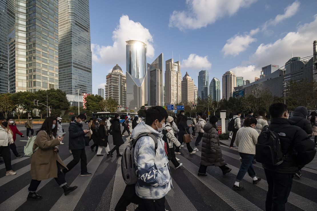 Pedestrians in Pudong's Lujiazui Financial District in Shanghai in January 2023. 