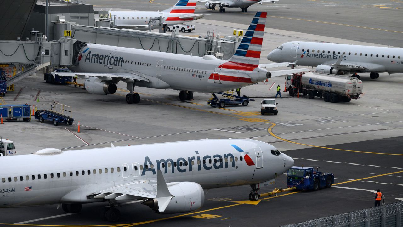 American Airlines airplanes sit on the tarmac at LaGuardia airport in New York on January 11, 2023. - The US Federal Aviation Authority said Wednesday that normal flight operations "are resuming gradually" across the country following an overnight systems outage that grounded departures. (Photo by Ed JONES / AFP) (Photo by ED JONES/AFP via Getty Images)