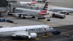 American Airlines airplanes sit on the tarmac at LaGuardia airport in New York on January 11, 2023. - The US Federal Aviation Authority said Wednesday that normal flight operations 