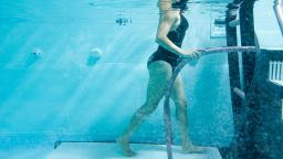 woman using the physical therapy under water treadmill. Please view these along with all