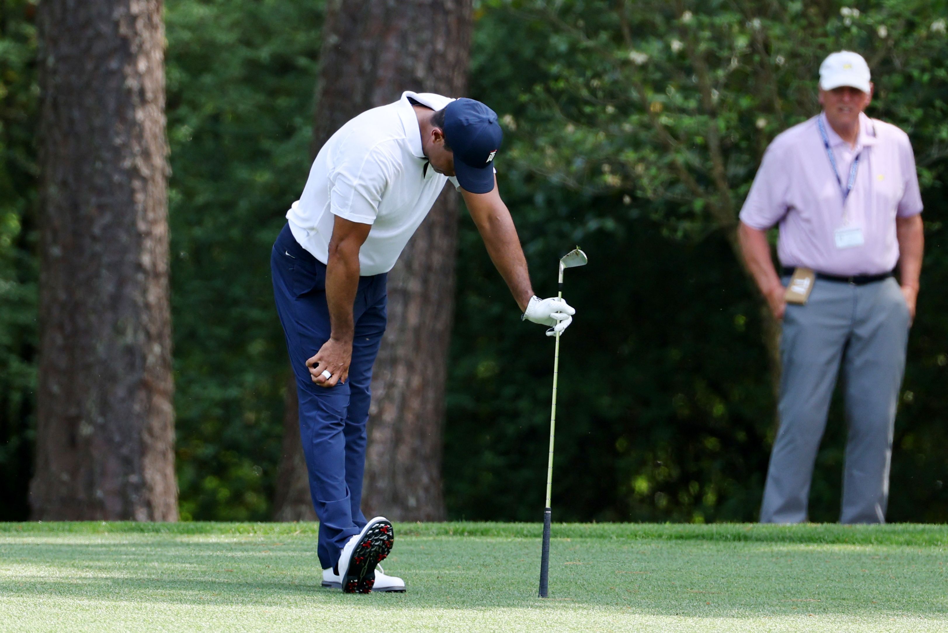 The Masters: Tiger Woods endures 'constant' pain during turbulent first  round