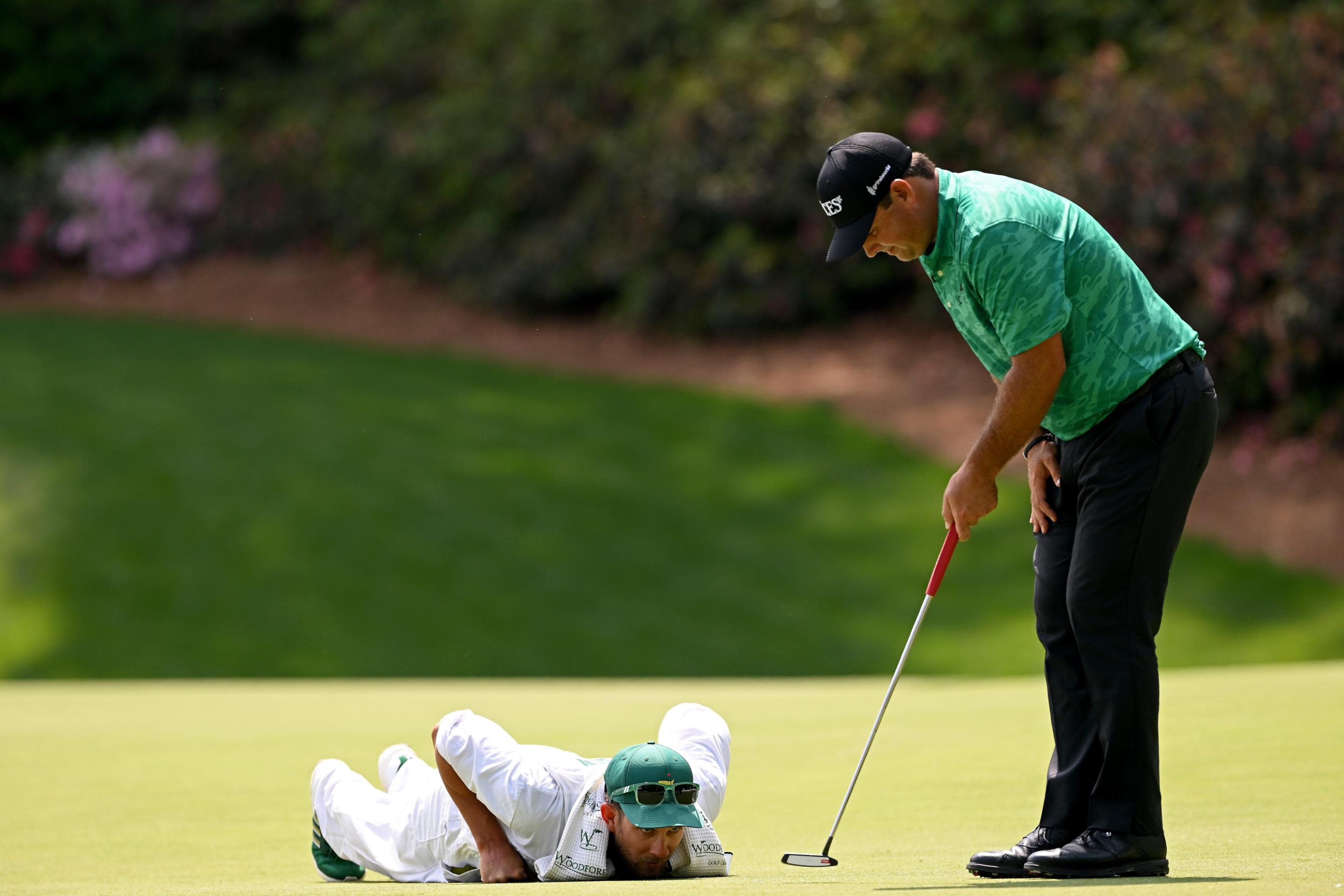 The Masters: Third round suspended as rain drenches field at