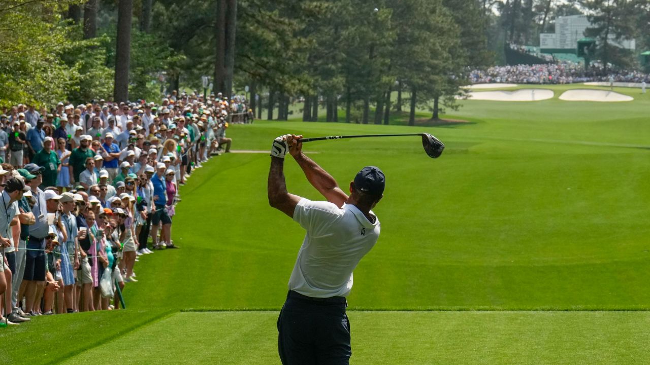 Woods tees off during the first round.