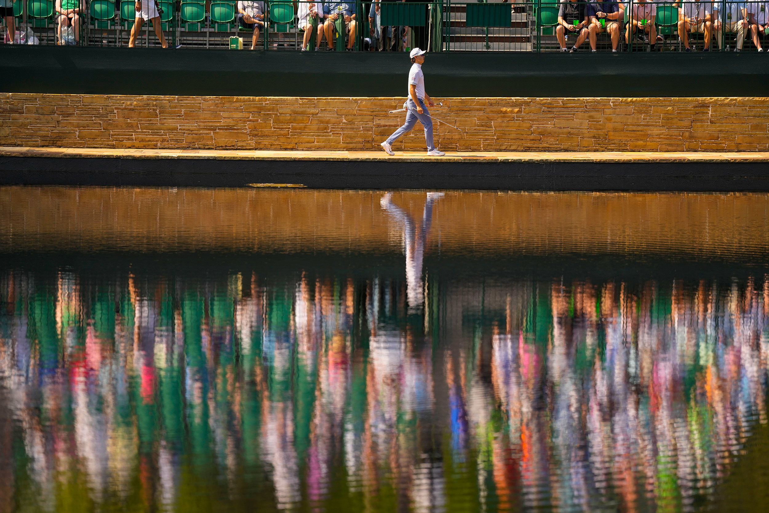 The Masters: Third round suspended as rain drenches field at