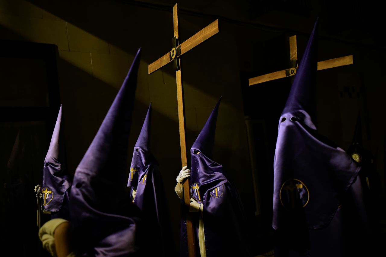 Masked devotees take part in a Holy Monday procession in Logroño, Spain, on April 3.