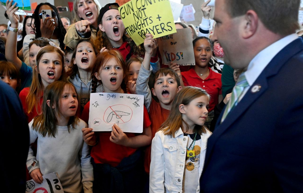 Children shout at Tennessee state lawmakers inside the state capitol in Nashville on Monday, April 3. They were among those protesting gun violence and calling for reforms after a mass shooting left six people dead last month at a private elementary school in the city.