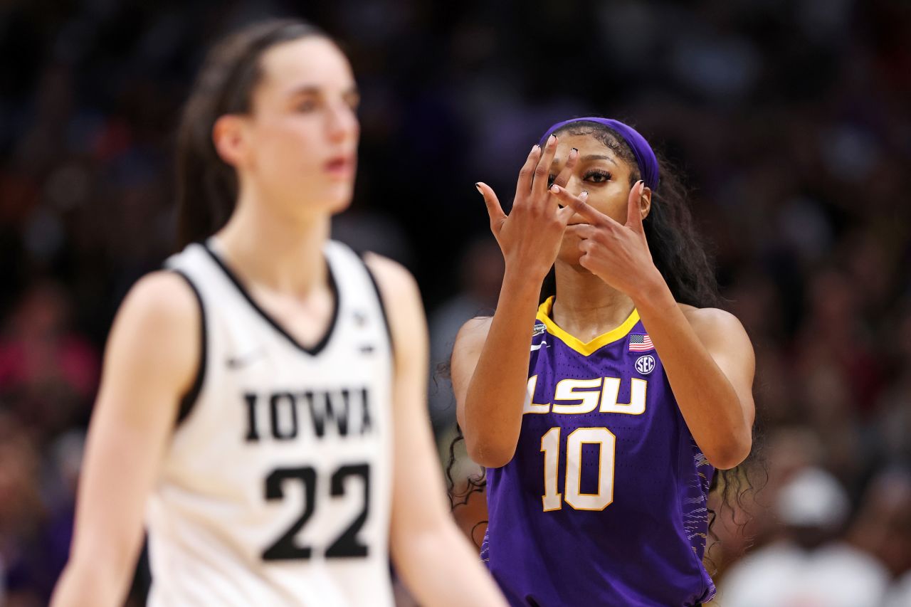 LSU basketball player Angel Reese gestures toward her ring finger in the final moments of the national championship game against Iowa on Sunday, April 2. <a href=