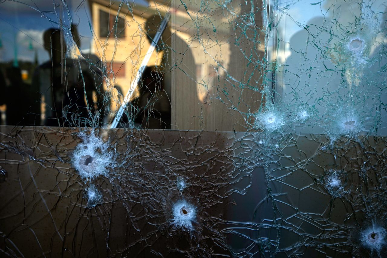 Damage from an intercepted rocket is seen at a shopping center in Shlomi, Israel, on Thursday, April 6. Dozens of rockets were fired from Lebanon into Israel, the Israeli military said, in a major escalation that comes amid regional tensions over Israeli police raids at the al-Aqsa mosque in Jerusalem. It was the largest such attack since a 2006 war between the two countries left around 1,200 Lebanese people and 165 Israelis dead.