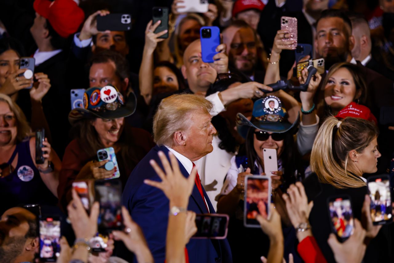 Former US President Donald Trump arrives to deliver remarks at his Mar-a-Lago resort in Florida on Tuesday, April 4. Earlier in the day, he pleaded not guilty to 34 counts of falsifying business records. Speaking at Mar-a-Lago, he told his supporters he 