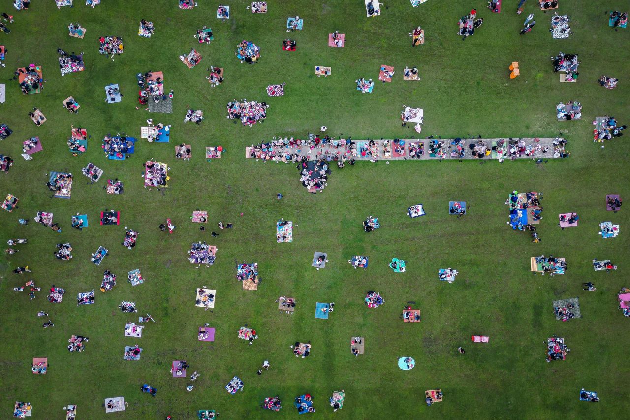 This aerial photo shows Muslims breaking their Ramadan fast together in Kuala Lumpur, Malaysia, on Sunday, April 2.